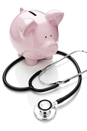 piggy bank and stethoscope - health savings account