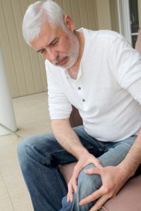 senior man with arthritis pain