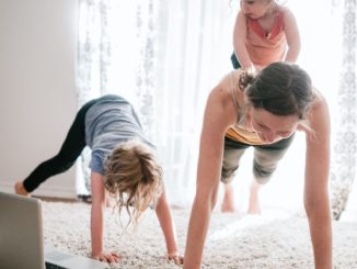 Home workout at the living room with children