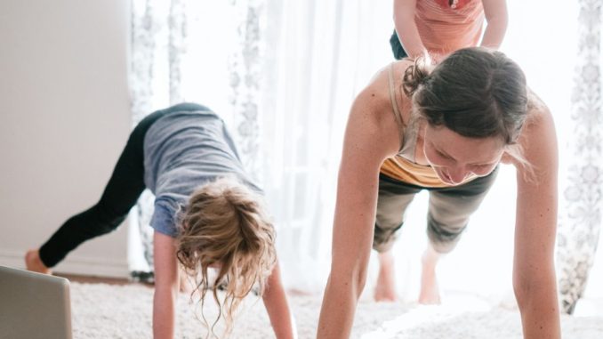 Home workout at the living room with children